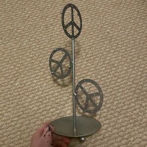 Steel earring and accessory holder plus dish on bottom.